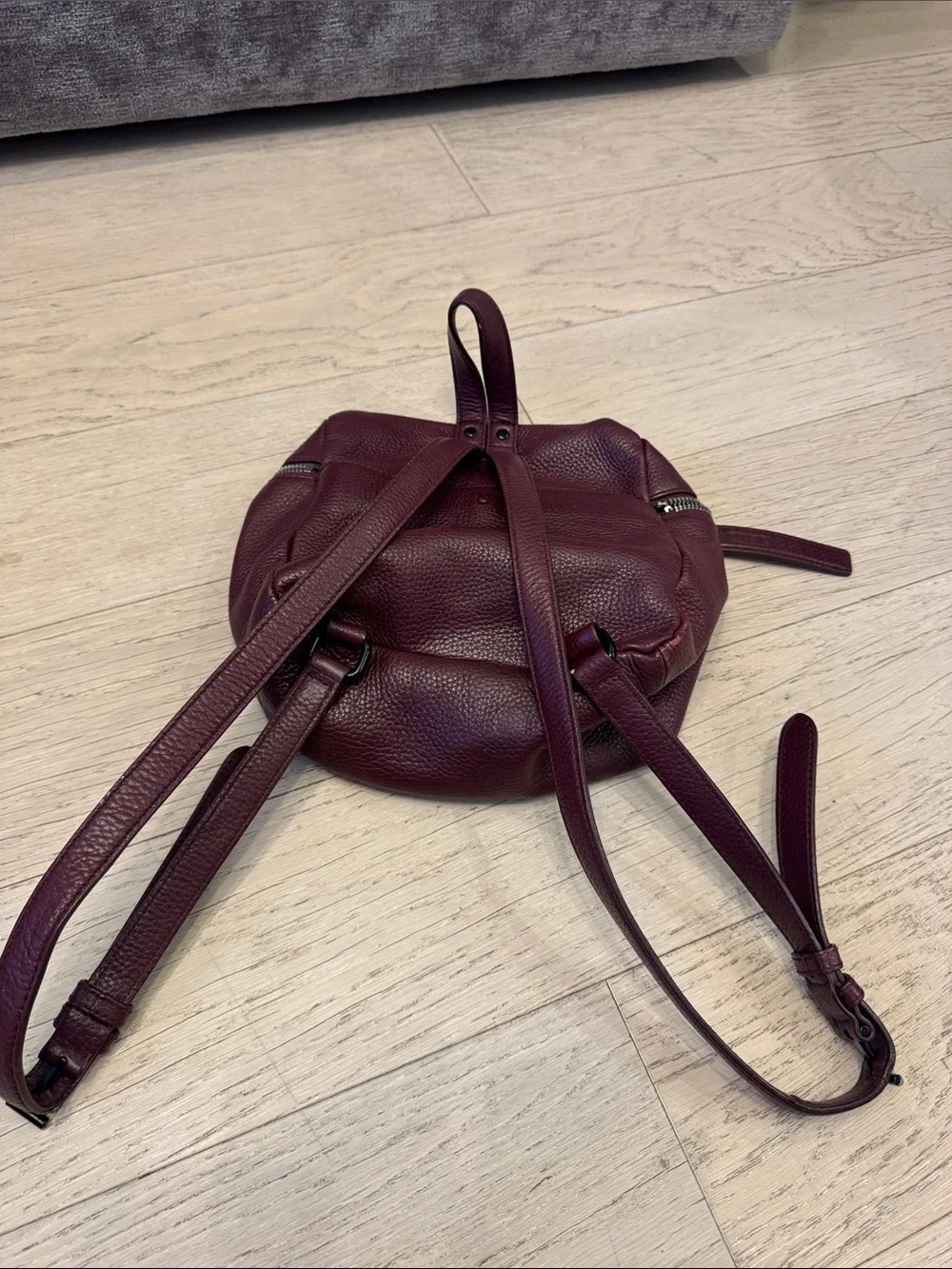 Pebbled Leather Round Backpack in Deep Burgundy